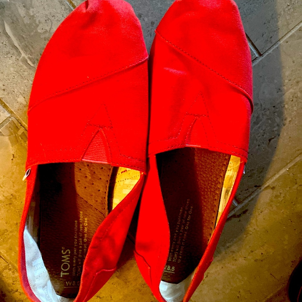 Orange, canvas , Tom’s slip ons. Very comfy.